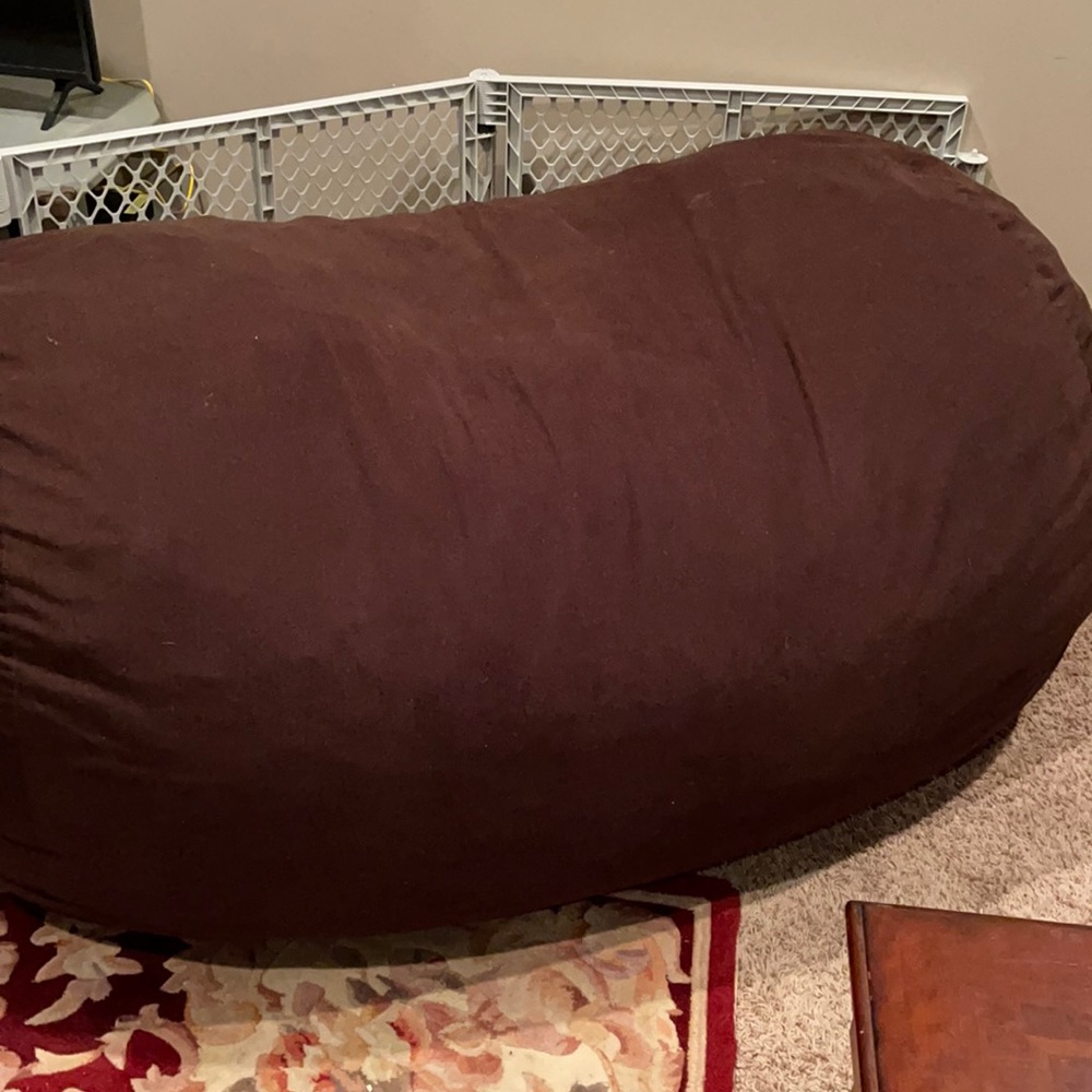 This is a dark brown big how the size of a couch